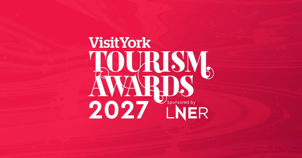 White text on a red background which says VisitYork Tourism Awards 2027