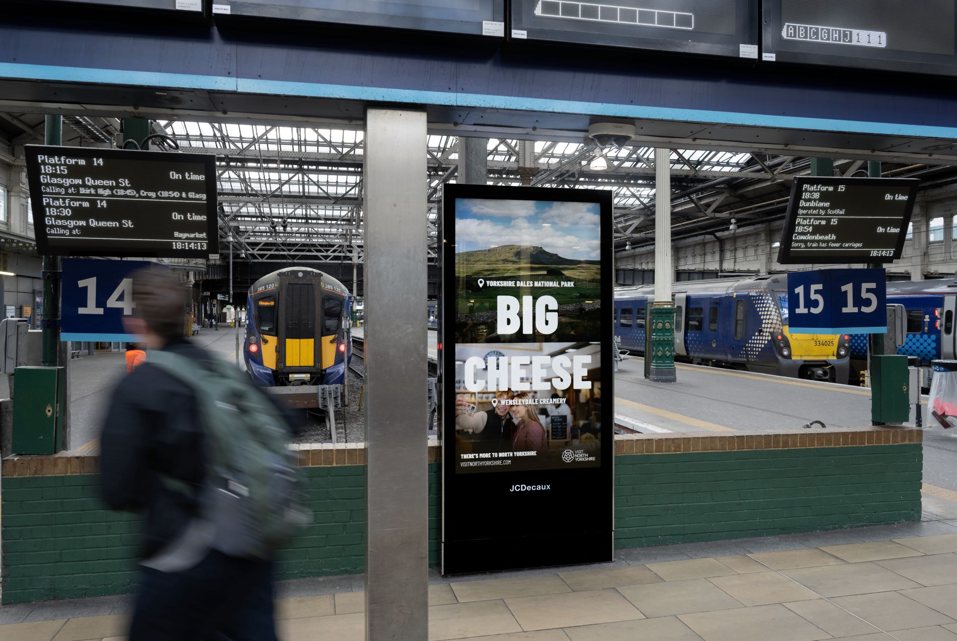 Visit North Yorkshire June26 Edinburgh Waverley A digital screen in train station